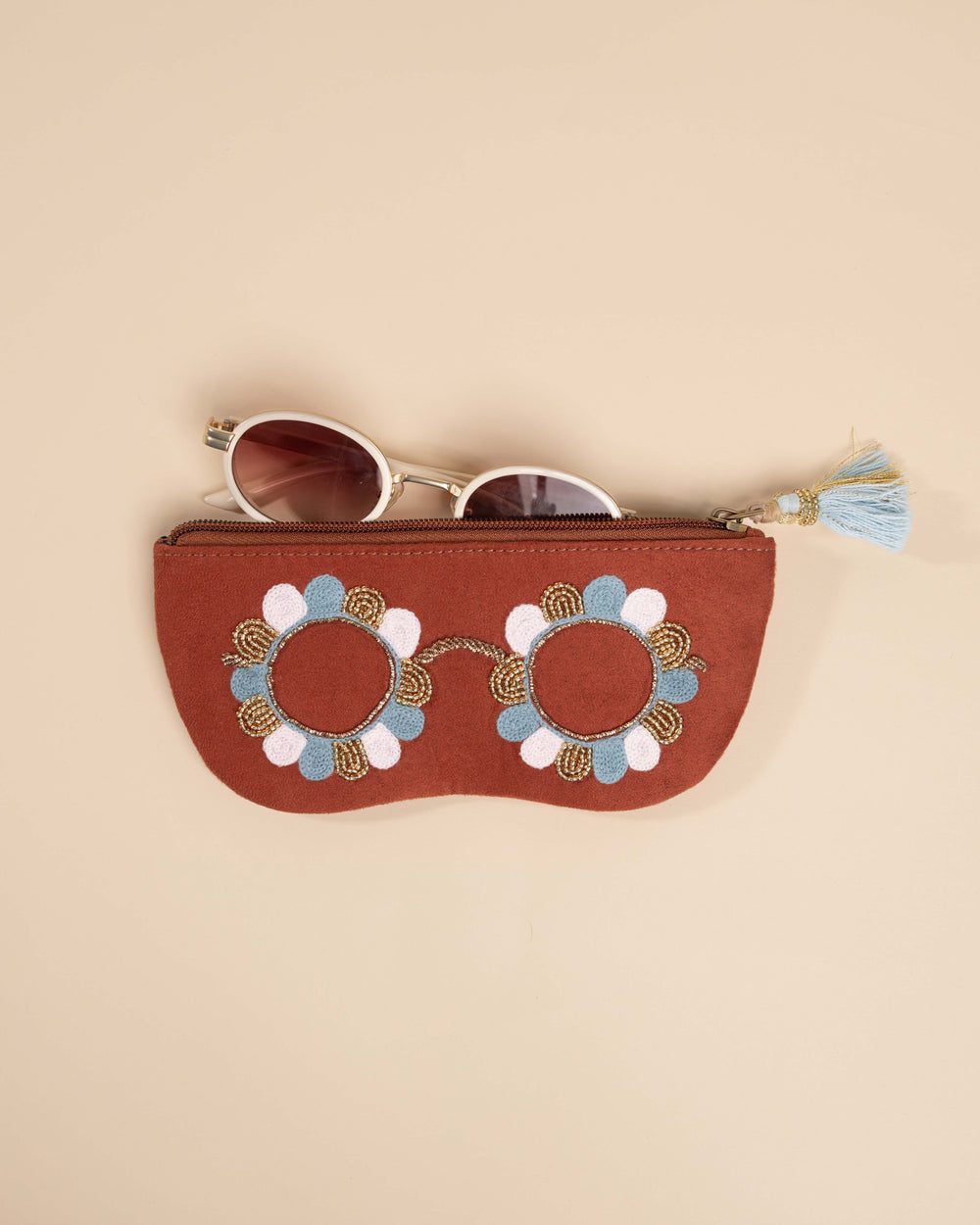 Clara Rust sunglass cover in rust-colored fabric with floral hand embroidery – handcrafted chashma pouch
