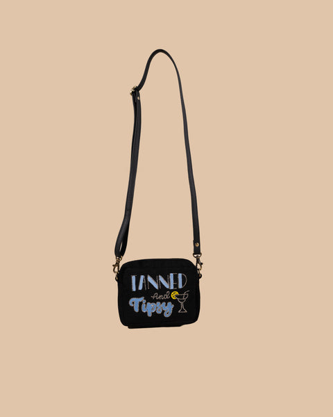 tanned and tipsy sling bag