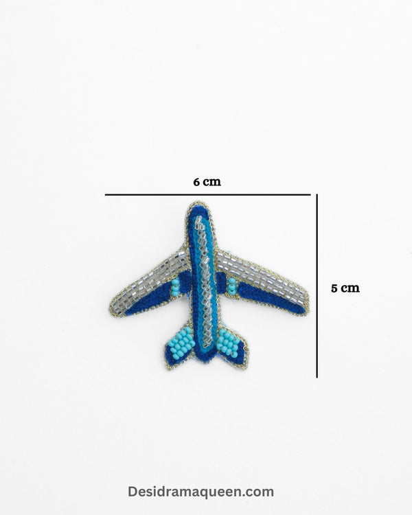 Blue and silver embroidered airplane brooch with beadwork