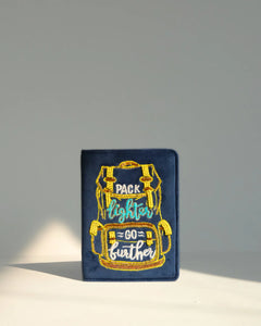 Embroidered patch with a backpack design and text on a blue background