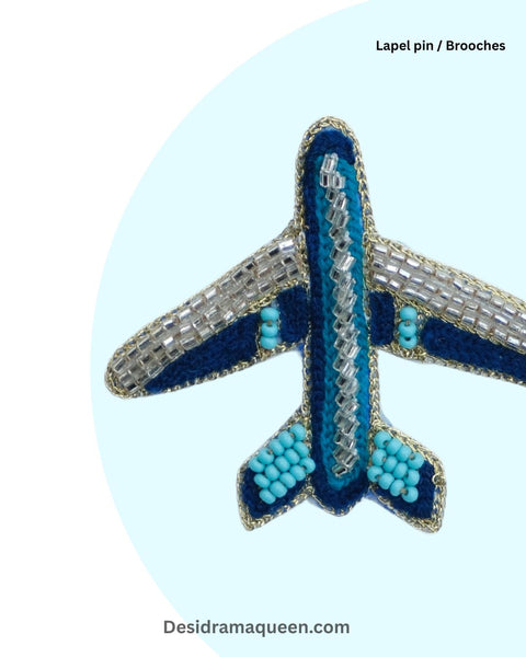 Unique airplane brooch crafted with detailed bead embroidery, aviation-inspired handmade lapel pin gift for travelers.