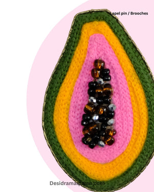 Colorful papaya-shaped brooch with vibrant embroidery and beadwork, quirky tropical jewelry gift for fruit and fashion lovers.