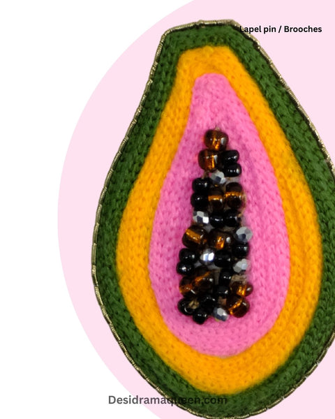 Colorful papaya-shaped brooch with vibrant embroidery and beadwork, quirky tropical jewelry gift for fruit and fashion lovers.