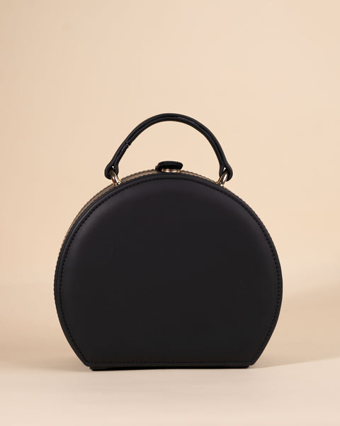 Black evening bag with leopard bead design, gold chain, and box-style body