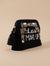 Luxurious black velvet sling bag with makeup design, golden embroidery, and black-white-gold tassel