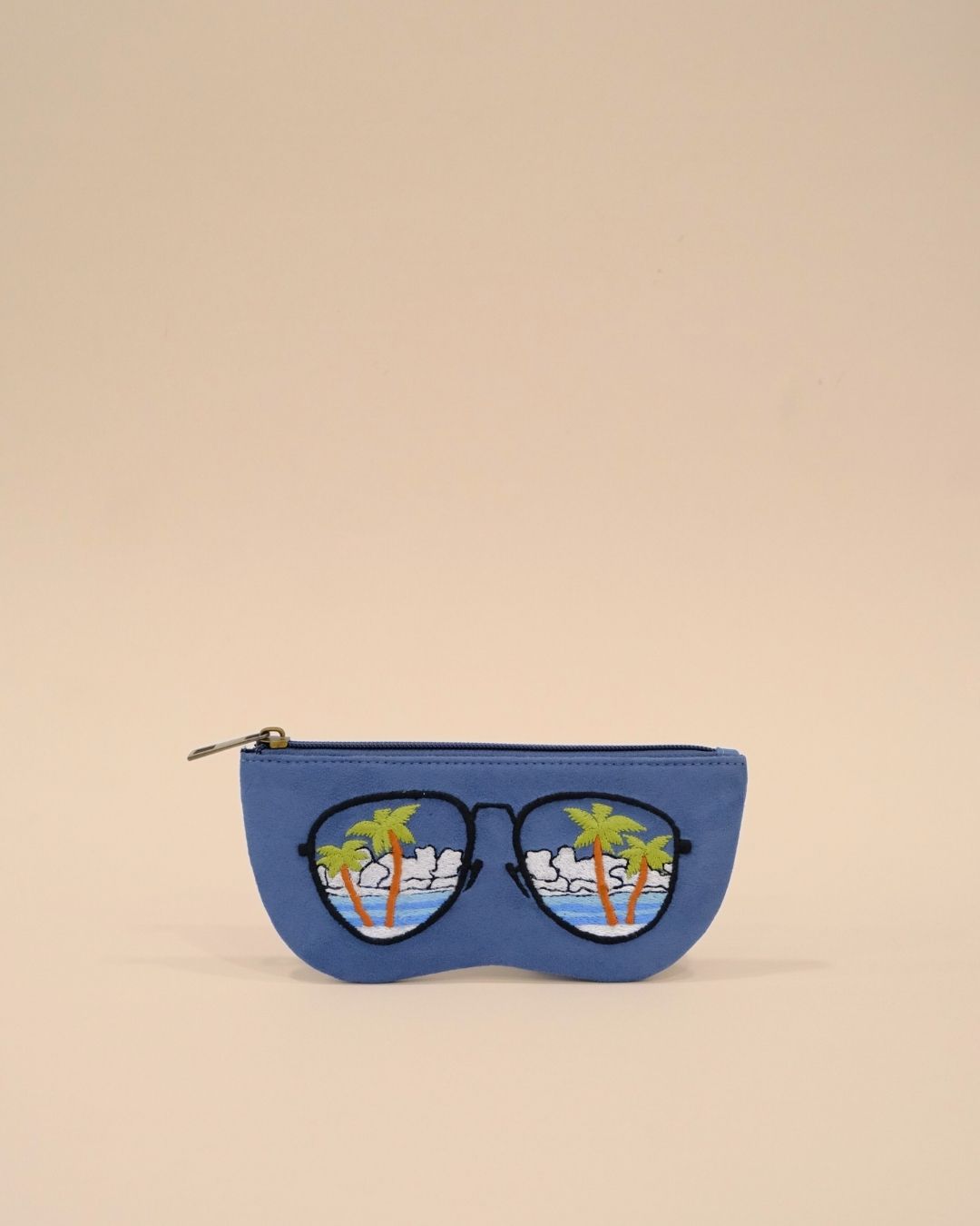Blue sunglass pouch with embroidered palm trees, ocean, and summer sky inside sunglasses design, handmade tropical eyewear case.