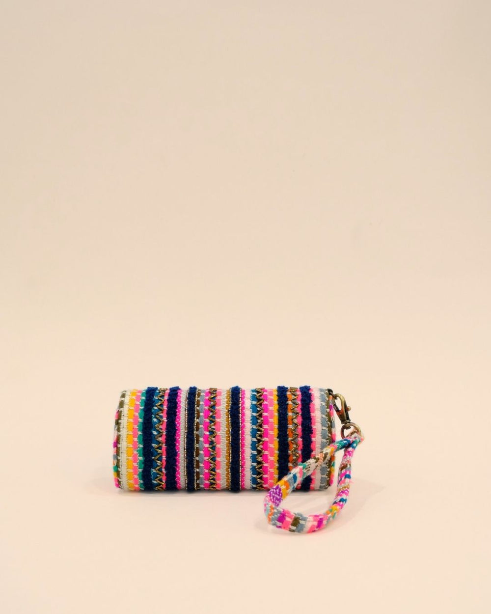 Handmade sunglass cover with colorful embroidered stripes in navy, pink, orange, yellow, and white, featuring a wrist strap.