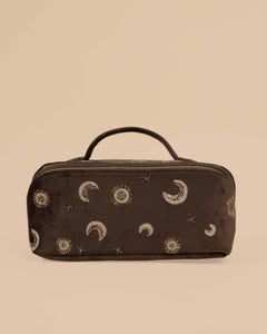 Brown makeup pouch with golden moon, sun, and star embroidery, stylish travel organizer bag.