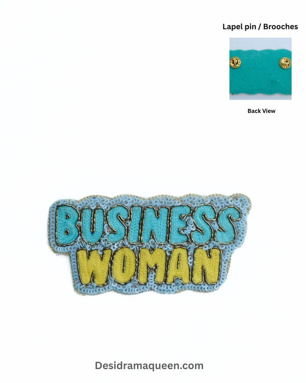 Handmade business woman brooch with beaded embroidery in blue and yellow, symbol of empowerment