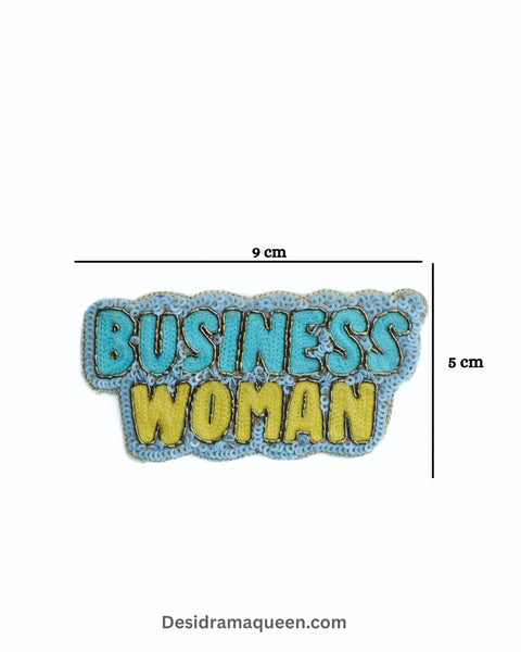 Blue and yellow embroidered brooch with Business Woman text