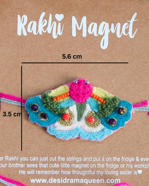 Close-up of Butterfly embroidered rakhi magnet on display card, showcasing handcrafted design and reusable keepsake fridge magnet.