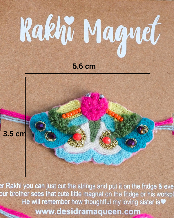 Close-up of Butterfly embroidered rakhi magnet on display card, showcasing handcrafted design and reusable keepsake fridge magnet.