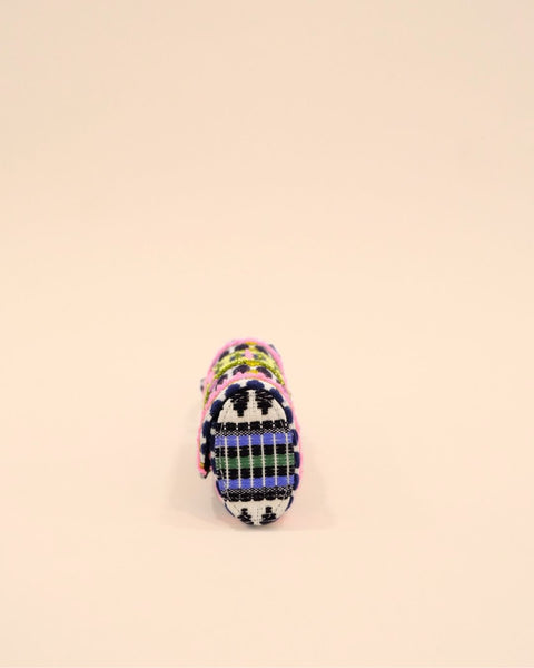 Sunglass cover with colorful tribal embroidery in pink, green, yellow, and blue on black and white fabric, handmade pouch with strap.