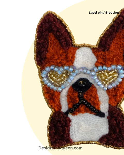 Brown and white dog brooch with beaded heart sunglasses, handmade embroidered lapel pin for jackets, bags, and shirts.