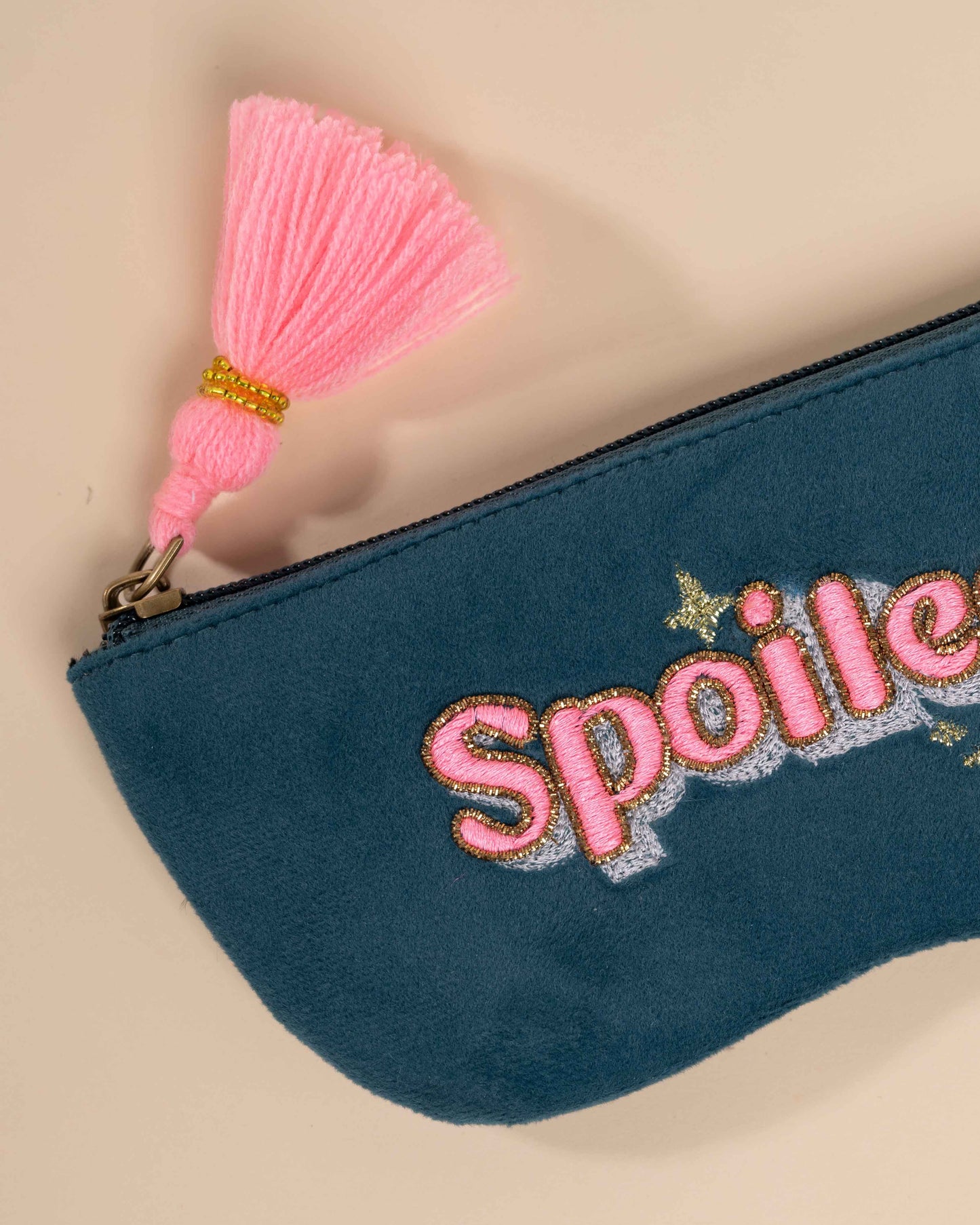 Stylish chasma pouch featuring intricate handwork, machine embroidery, and neon details
