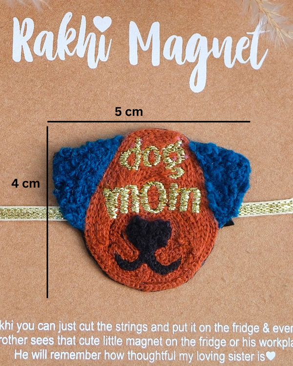Packaged Dog Mom Rakhi magnet on a wooden backdrop, featuring a cute handcrafted design for proud dog moms.