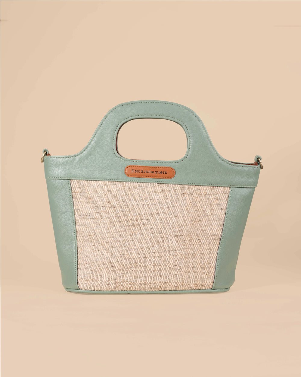 Handbag with floral embroidery on a beige background