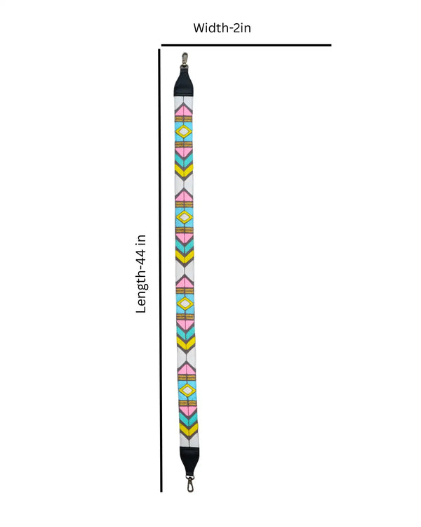 Colorful geometric patterned strap with black ends on a beige background