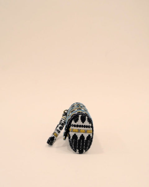 Sunglass pouch with black, white, gold, and blue tribal embroidery, handmade eyewear cover featuring a wrist strap for travel and daily use.