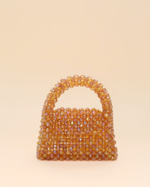 Trendy rainbow bead mini tote bag, perfect statement accessory for everyday or evening wear.