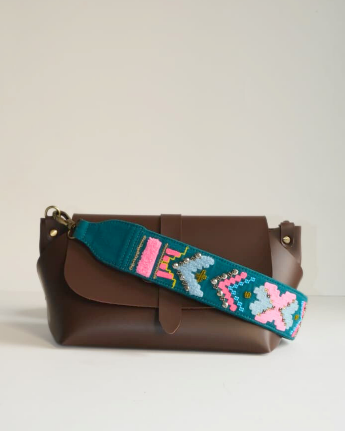 SLING BAG BROWN WITH GEOPOP TEAL EMBROIDERED STRAP