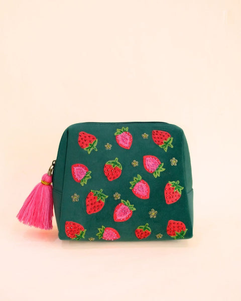 Green makeup pouch with embroidered strawberries and hot pink tassel zipper, handmade cosmetic bag for daily use.