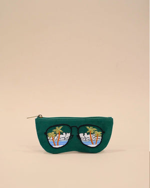 Green sunglass cover with embroidered palm trees, ocean waves, and sky reflected in sunglasses design, handmade tropical eyewear pouch.