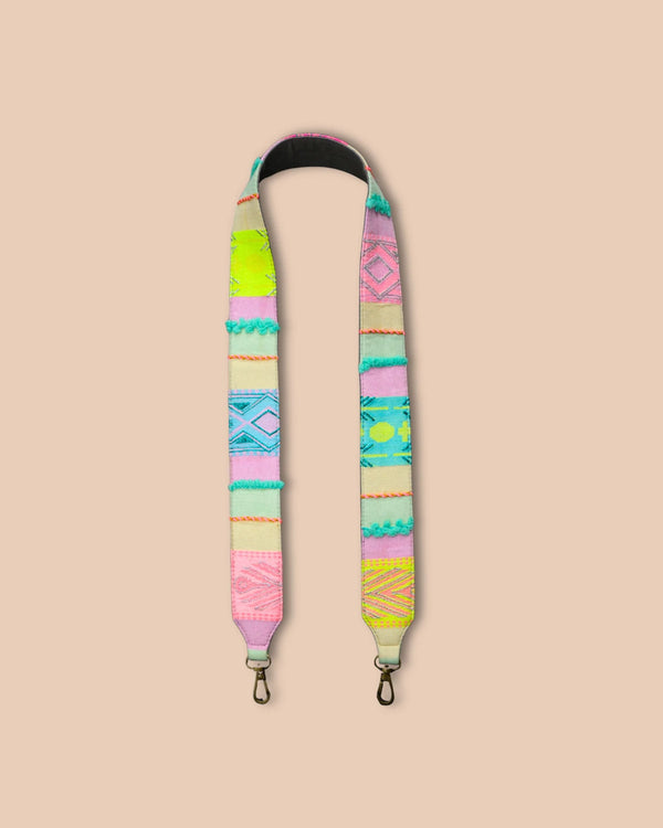 Colorful patterned strap on a beige background