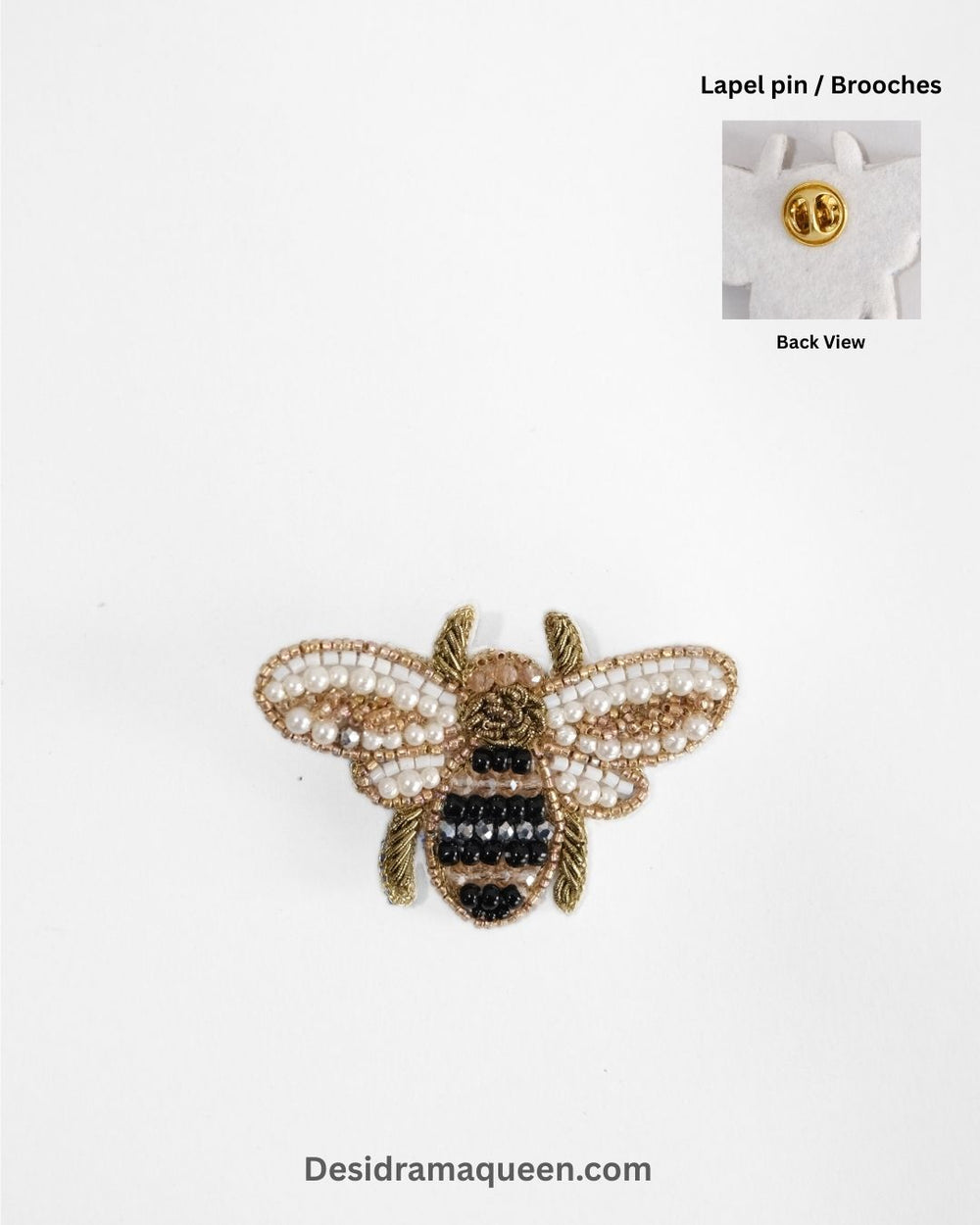 Handcrafted bee brooch with gold, black, and pearl beads, unique insect lapel pin accessory.