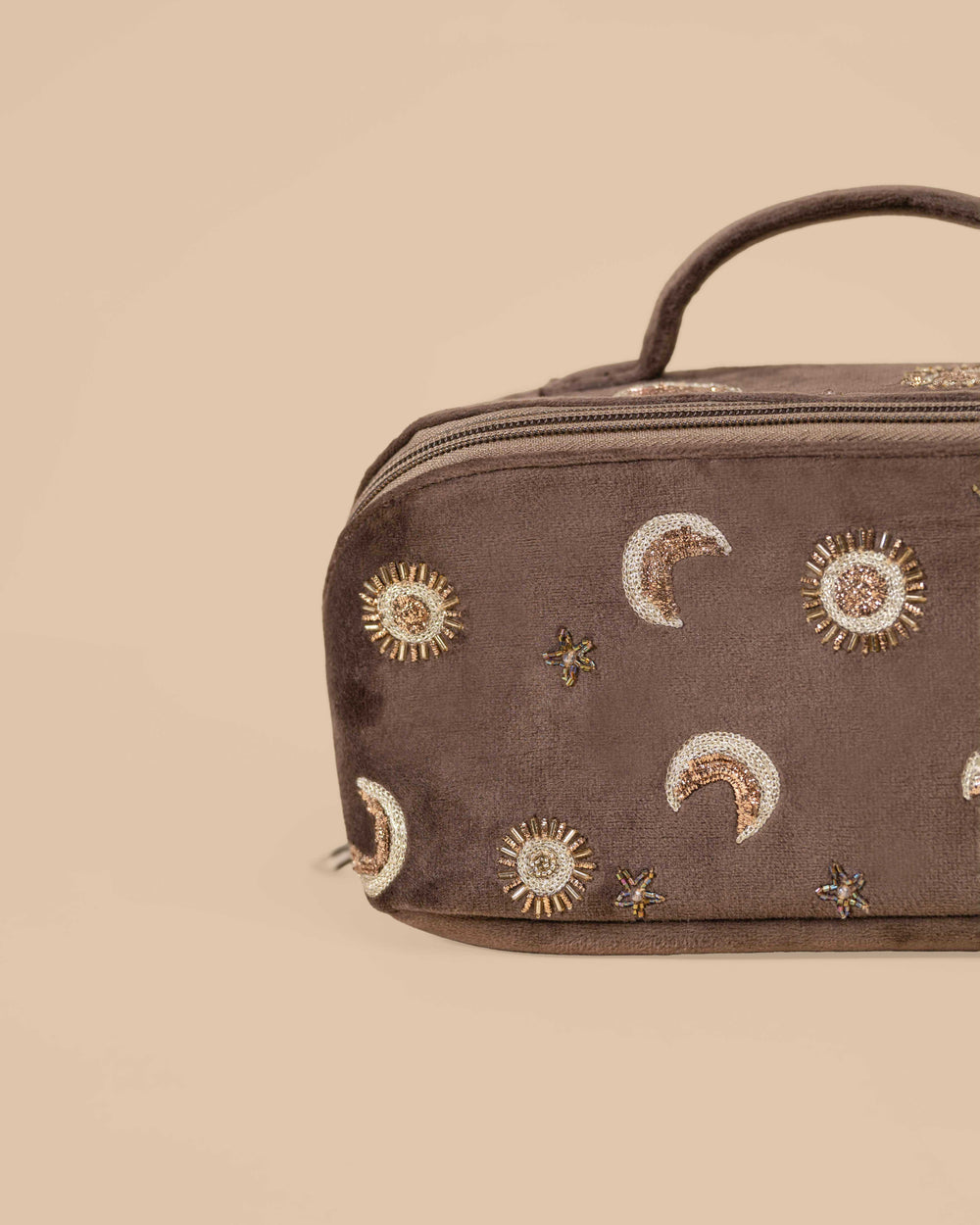 Brown makeup pouch with golden moon, sun, and star embroidery, stylish travel organizer bag.