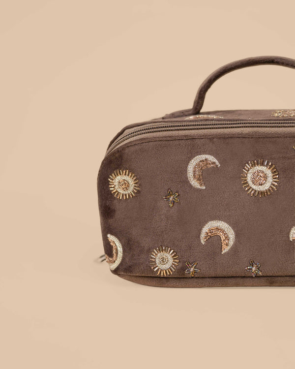 Spaciou Brown embroidered makeup pouch with celestial motifs, perfect for travel and daily use.