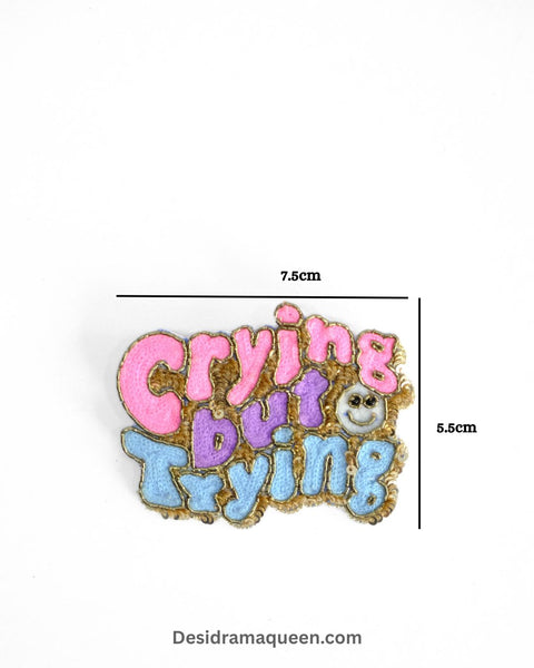 Quirky “Crying But Trying” brooch with colorful bead embroidery, perfect for jackets, bags, and statement fashion looks