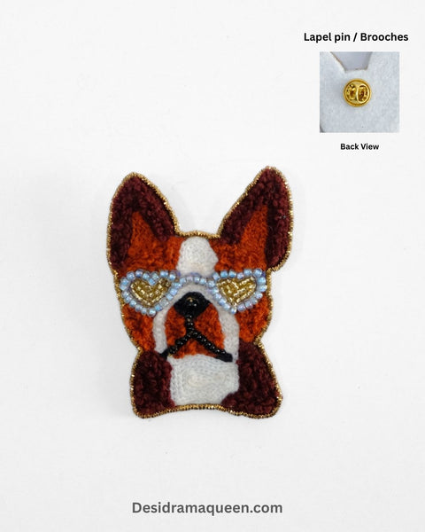 Handmade embroidered dog brooch with heart-shaped sunglasses, quirky lapel pin accessory with bead detailing.