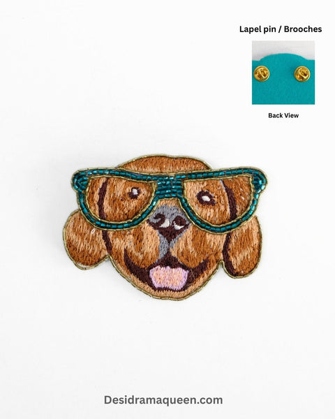 Handmade embroidered Labrador dog brooch with teal sunglasses, quirky beaded lapel pin for jackets, shirts, and bags.