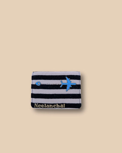 Handmade embroidered passport cover in black and white stripes.