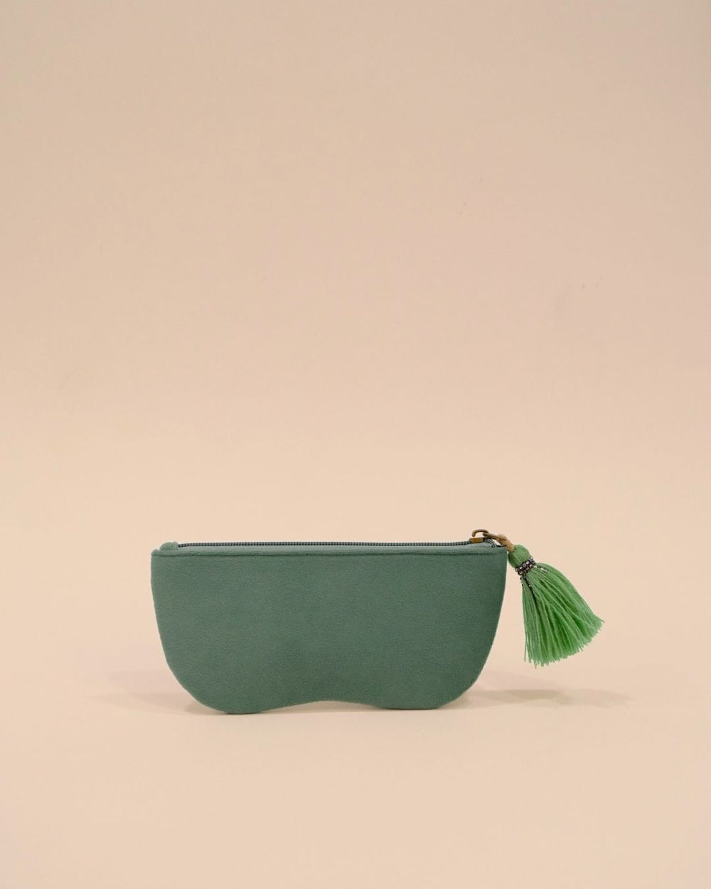 Green sunglass cover with round spectacle embroidery in golden, purple, and green beadwork, handmade pouch with tassel zipper.
