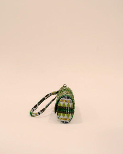 Green tribal embroidered sunglass case with olive and golden detailing, handmade eyewear pouch with strap.