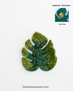 Handmade leaf brooch with green and gold bead embroidery, monstera lapel pin for jackets, shirts, and accessories.