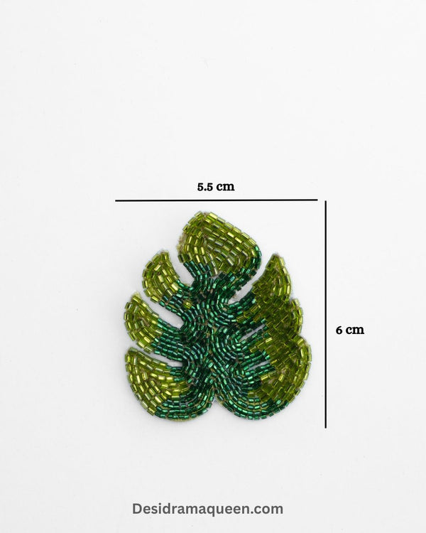 Green leaf brooch with intricate bead embroidery and gold detailing, handmade lapel pin for jackets, scarves, and bags