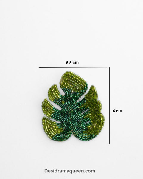 Green leaf brooch with intricate bead embroidery and gold detailing, handmade lapel pin for jackets, scarves, and bags