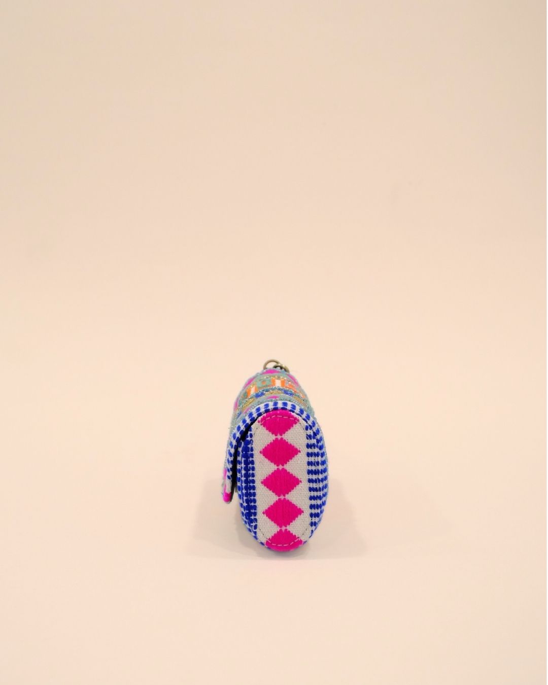 Bright multicolor sunglass case with neon pink, orange, and blue embroidery on fabric base, handmade pouch with wrist strap.