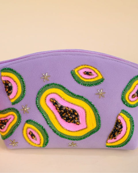 Lavender pouch decorated with colorful papaya embroidery and tassel zipper, handmade bag for cosmetics, toiletries, or accessories.