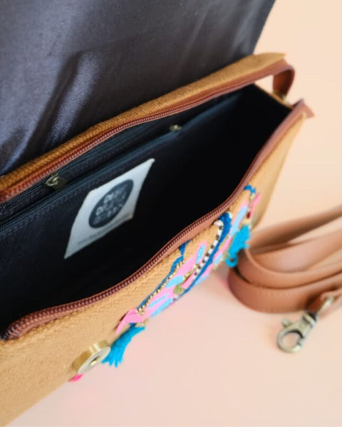Handcrafted ethnic makeup clutch with vibrant embroidery for women