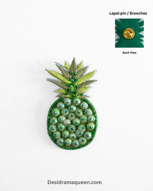 Handmade pineapple brooch with green sequin bead embroidery, quirky fruit lapel pin for jackets, shirts, and bags.