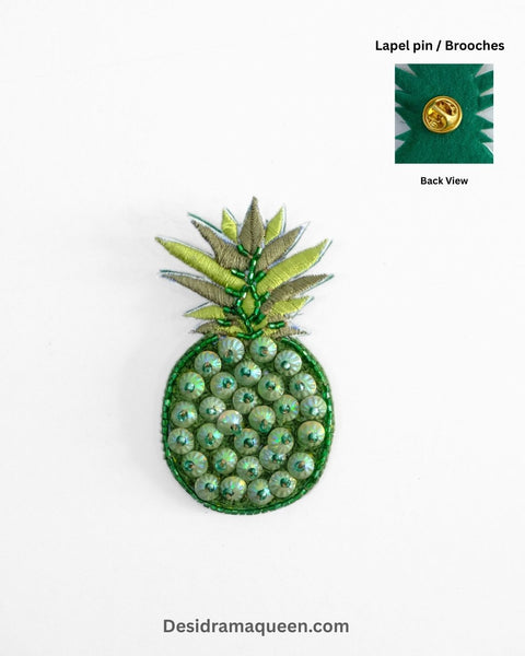 Handmade pineapple brooch with green sequin bead embroidery, quirky fruit lapel pin for jackets, shirts, and bags.