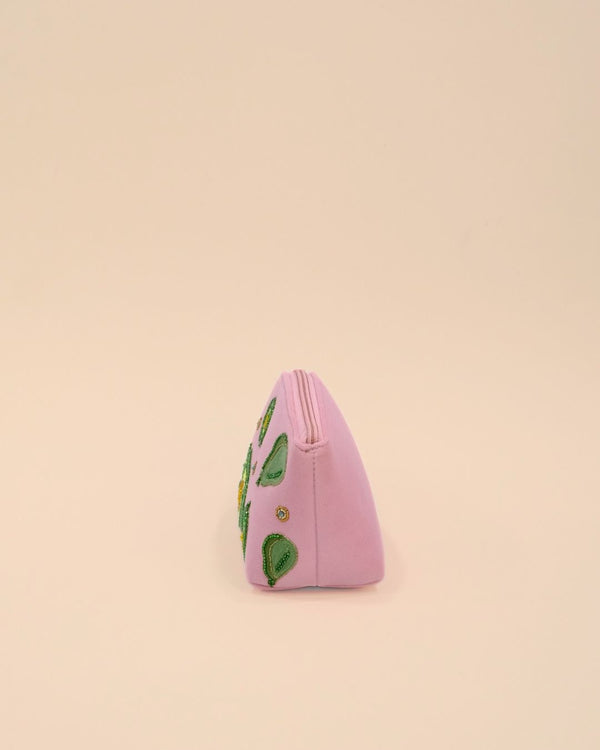 Pink fabric pouch decorated with avocado embroidery, green tassel zipper, handmade bag for makeup or accessories.