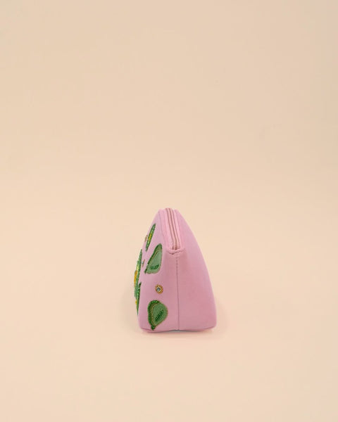 Pink fabric pouch decorated with avocado embroidery, green tassel zipper, handmade bag for makeup or accessories.