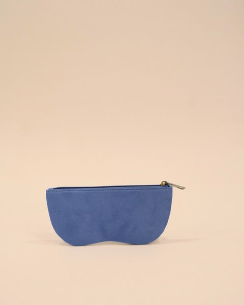 Hand-embroidered blue sunglass case featuring tropical beach scene with palm trees and waves, quirky handmade eyewear pouch.