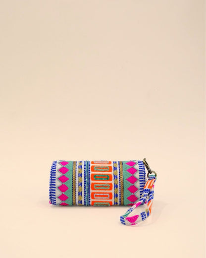 Colorful tribal embroidered sunglass pouch with bold pink, orange, blue, and green patterns, handmade eyewear cover with strap.