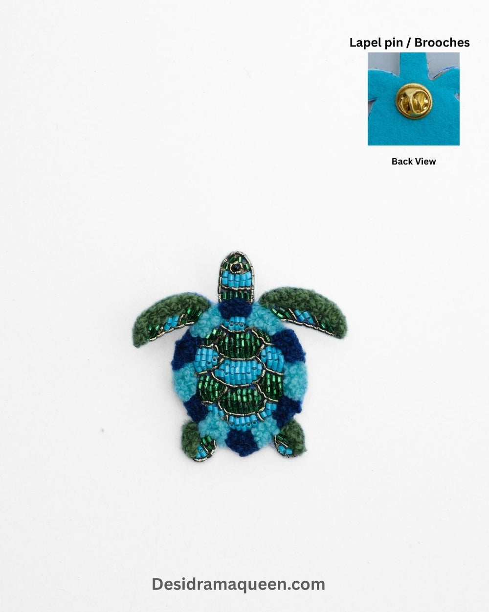Handmade turtle brooch with blue and green bead embroidery, sea-inspired lapel pin for jackets and bags.